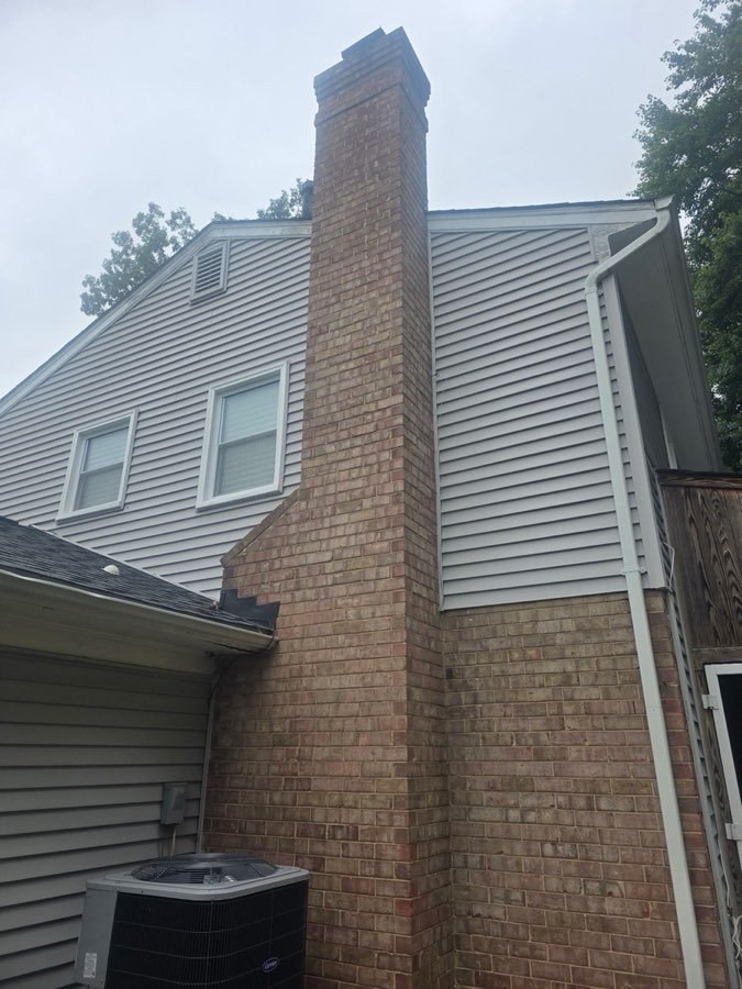 Masonry chimney built on an exterior wall - prone to cold-start smoking