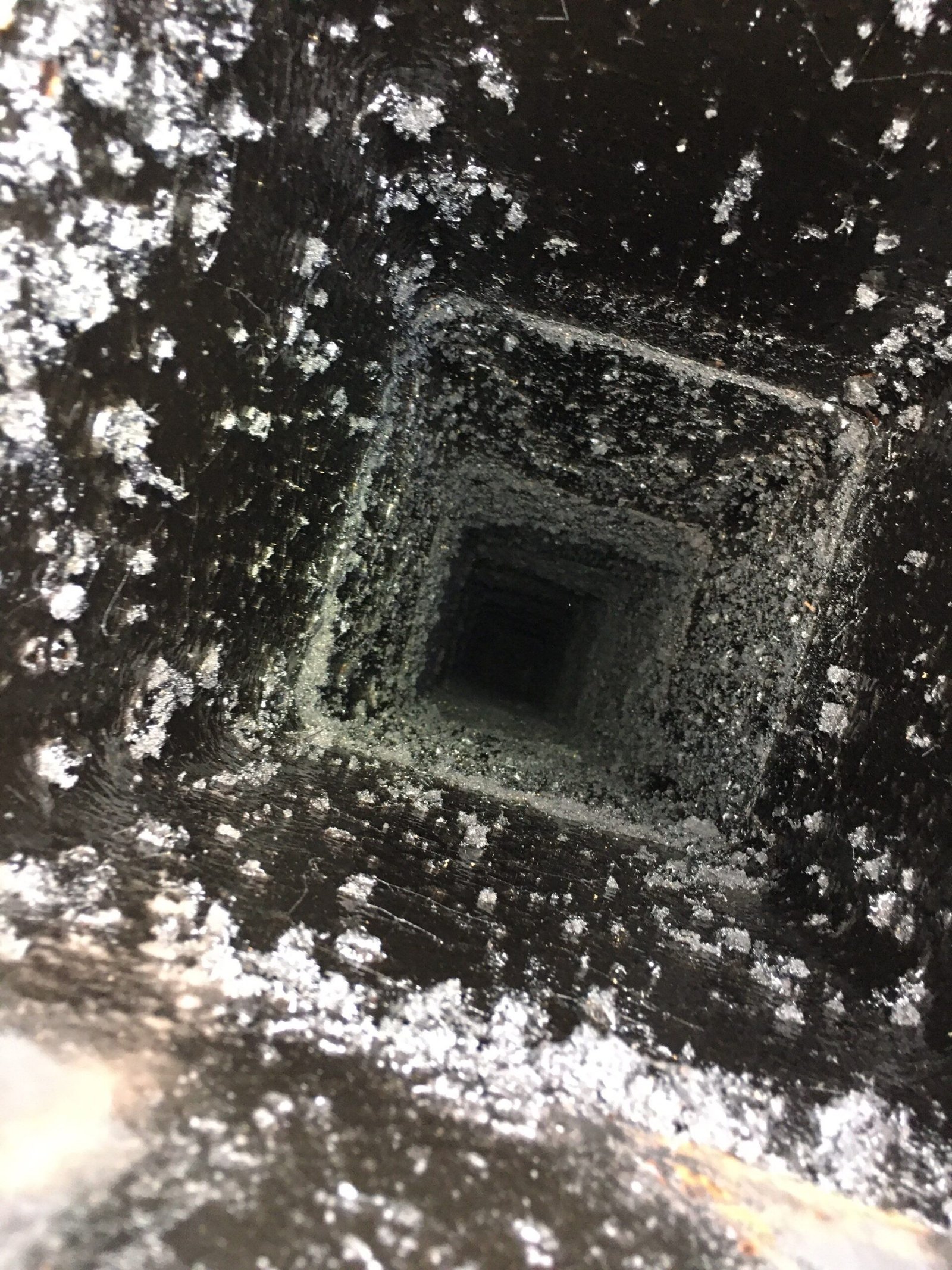 Puffy expanded creosote coating the inside of a chimney flue